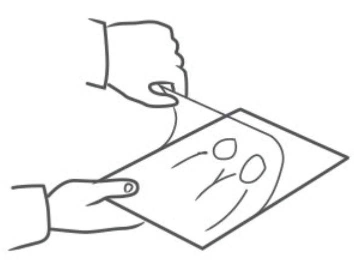 Applying the laminate sheet to the printed skin